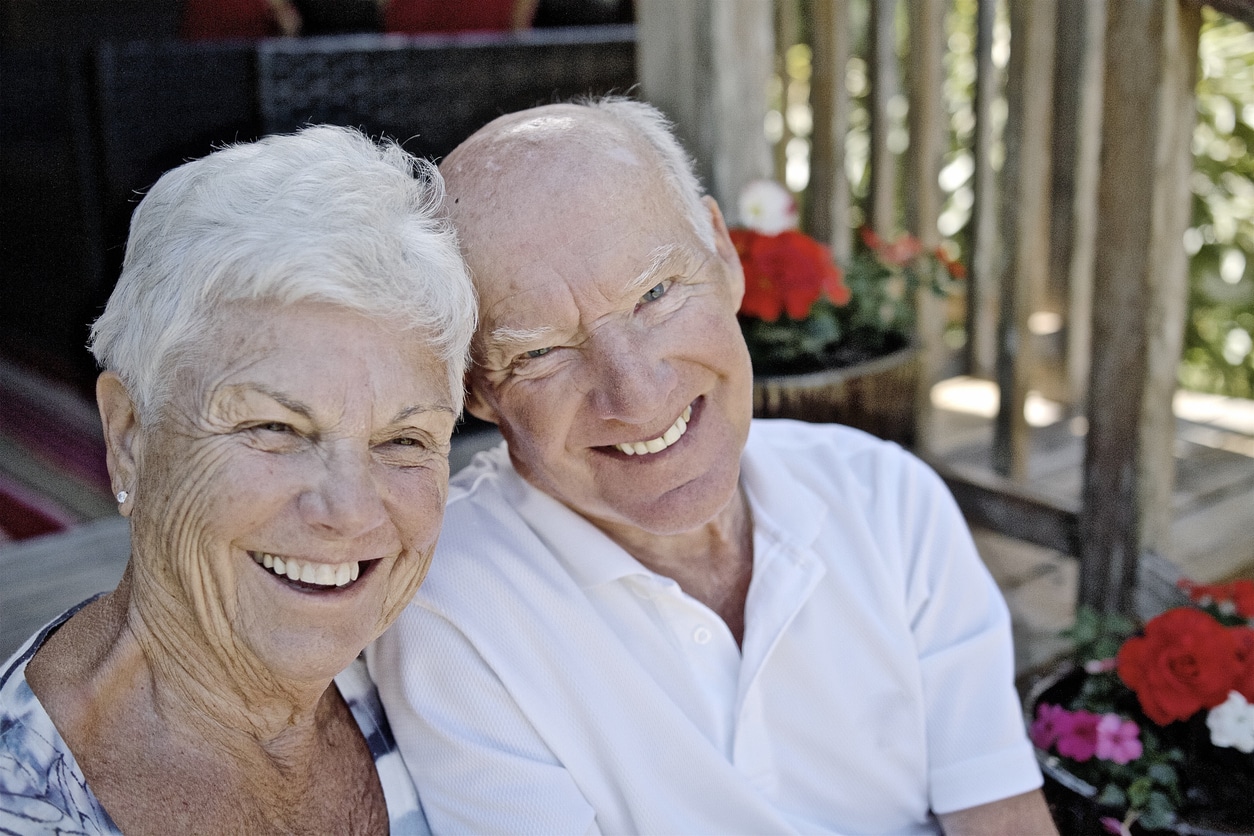 Couple with hearing loss smiles together